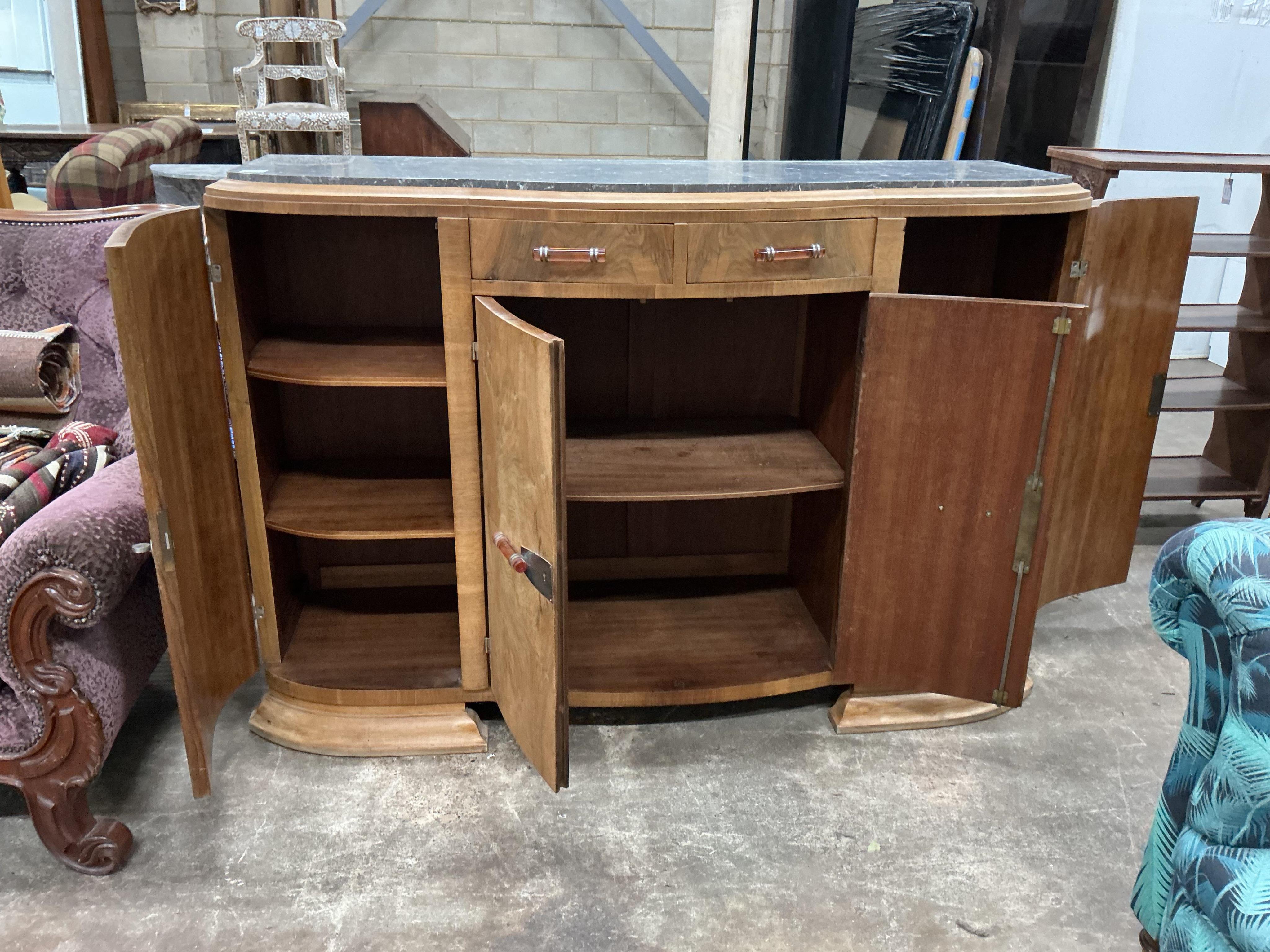 An Art Deco walnut marble topped bow front sideboard, width 158cm, depth 50cm, height 110cm